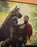 Egérpad a Kingdom Come: Deliverance II játékból – Keyart Henry és Matt az erdőben motívummal.