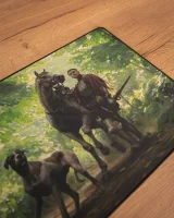 Egérpad a Kingdom Come: Deliverance II játékból – Keyart Henry és Matt az erdőben motívummal.