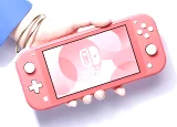 Konzole Nintendo Switch Lite - Coral + Animal Crossing: New Horizons + 3 měsíce NSO